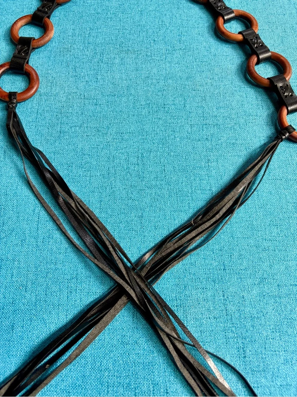 Brown leather fringe belt with wooden circular links and tassels #boho #western